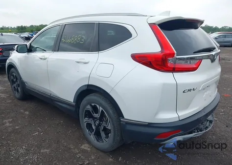2018 Honda Cr-V Touring z USA, uszkodzony, nr VIN 5J6RW1H93JL002446